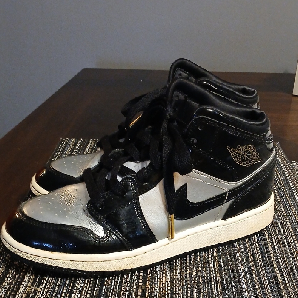 Jordan 1s Black and Silver High-Top Sneakers